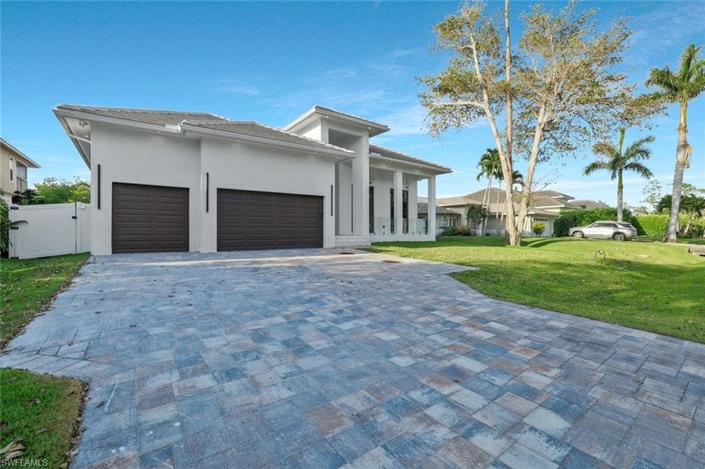 1317 Cypress Woods Dr, Naples