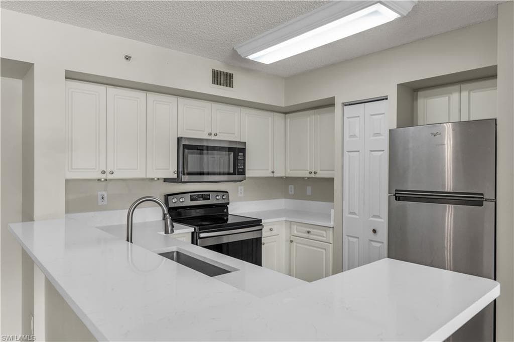 1230 Wildwood Lakes Blvd #105, The Enclave at Naples