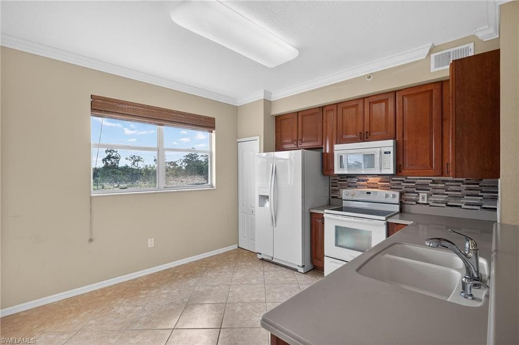 6816 Sterling Greens Pl #303, Naples, photo 3