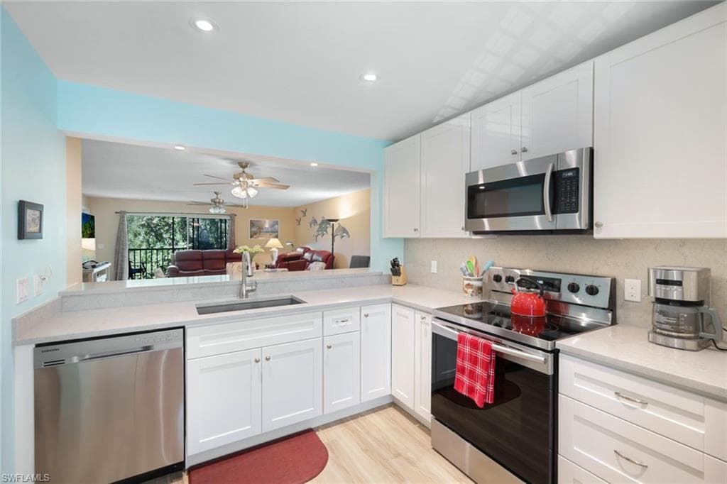 3041 Sandpiper Bay Cir #h203, Naples, photo 3