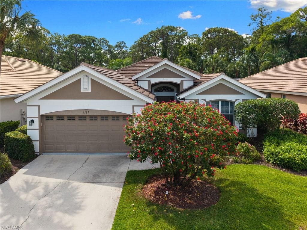 1717 Winding Oaks Way, Naples