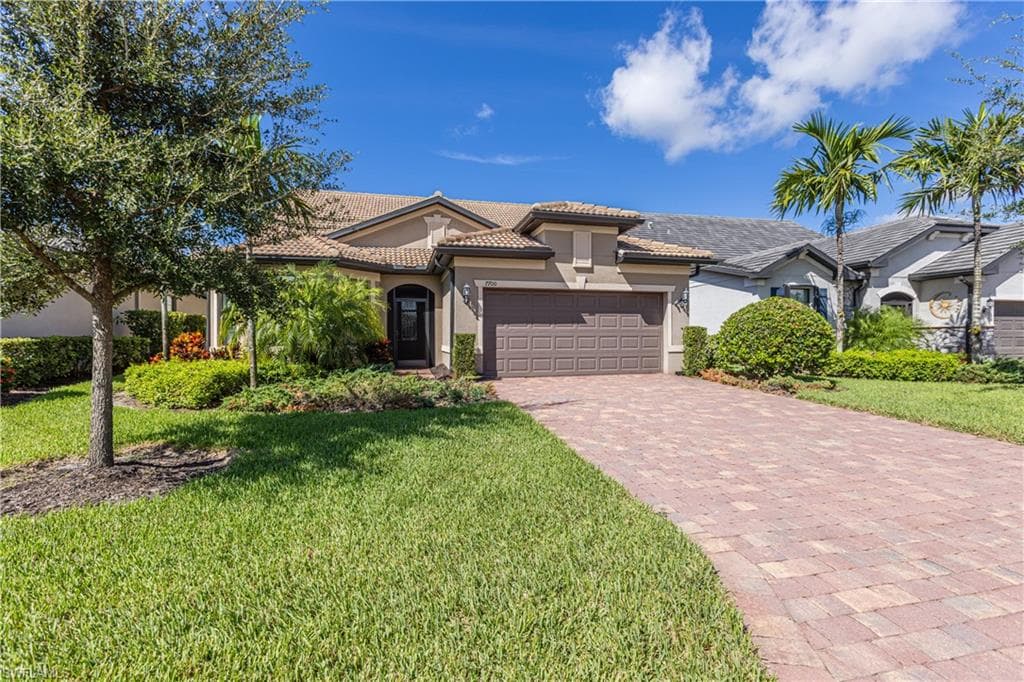 7700 Winding Cypress Dr, Naples
